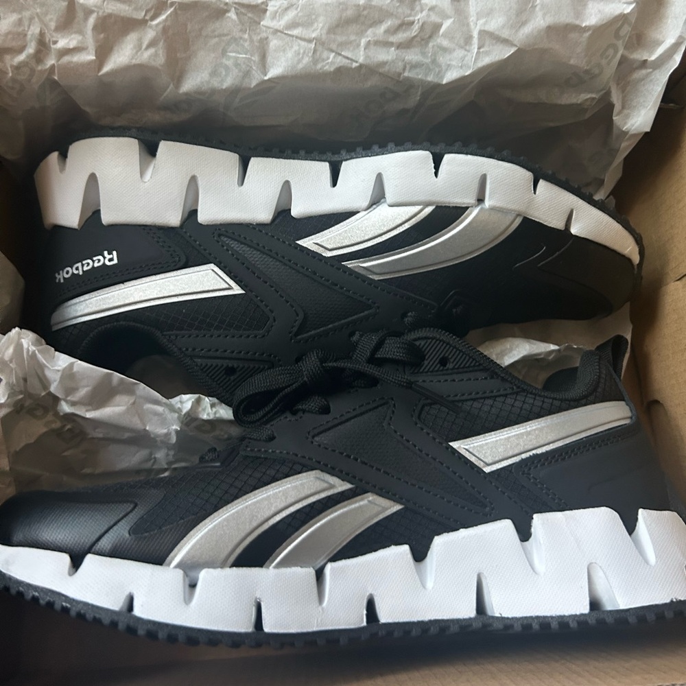 Brand is Reebok, size is a 7.5 in women,condition is completely new,never worn.